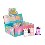 Display box of 'Blow Bubble' squishy toys, featuring unicorn-shaped figures in various pastel colors. The box contains individually wrapped squishy toys, with three unicorns shown in front: one white with pink accents, one pink with mint green accents, and one purple with dark blue accents.
