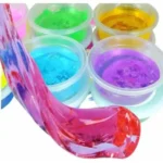 12 Colour Crystal Slime DIY Kit featuring twelve colourful stretchy slime tubs in a clear retail display box, suitable for children's sensory play and wholesale toy retailers.