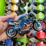 Speed Moto friction toy motorcycle with lights and sound in a 12-piece retail display box. Colourful sports bike toys available wholesale from SDMAX Toys Wholesaler.