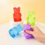 Colourful Gummy Bear Squishy Stress Toys in assorted colours supplied in a 12-piece retail display box. Slow-rising sensory fidget toy available from SDMAX Toys Wholesaler UK.