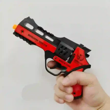 Red and black cowboy-style 8 shot ring cap toy revolver in retail blister packaging by SDMAX Toys Wholesaler UK