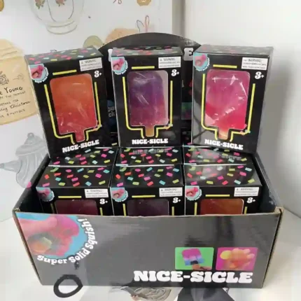 Nice-Sicle Ice Cream Squishy slow-rise popsicle stress relief toy in assorted gradient colours, supplied in individual retail boxes and a 12-piece countertop display by SDMAX Toys Wholesaler.