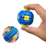 Blue and yellow Push-to-Spin Kinetic Ball featuring a press-button activated auto-rotating sensory spinner design for stress relief, supplied by SDMAX Toys Wholesaler.