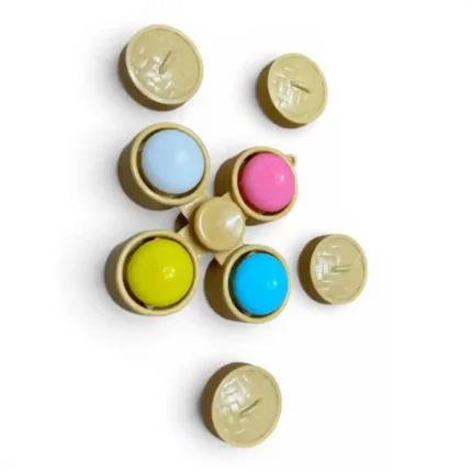 Sensory Dumpling Spinner Fidget Toy with four colourful silicone dumpling buttons inside miniature bamboo steamer baskets and central spinner by SDMAX Toys Wholesaler.