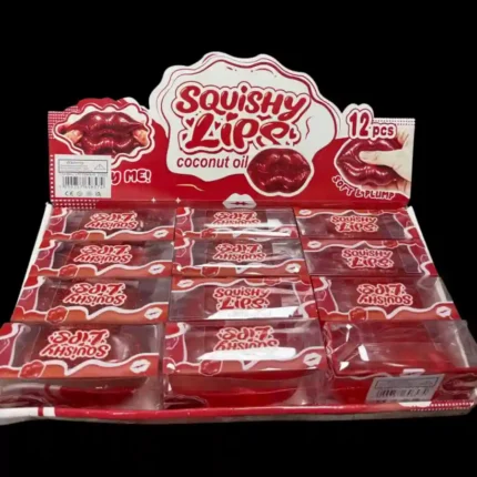 Red glitter lips squishy toy wholesale display box containing 12 soft squeezable novelty toys from SDMAX Toys Wholesaler