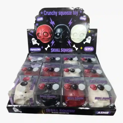 Skull Squish Crunchy Squeeze Toy, 6.5x5.5cm, available in red, black and white. 12 pieces per box, ideal for toy shops, party bags, gifts and resale