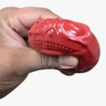 Skull Squish Crunchy Squeeze Toy, 6.5x5.5cm, available in red, black and white. 12 pieces per box, ideal for toy shops, party bags, gifts and resale