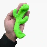 Sand Squeeze Cactus Toys wholesale. Soft 13×8cm textured sensory squeeze toys in assorted colors, supplied in 12-piece retail display boxes