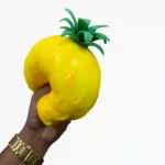 Scented Pineapple Squishy Toys wholesale. Large 20×14cm soft squishy toys with poke and stretch features, supplied in 6-piece retail display boxes