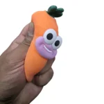 Crunchy Carrot Pinch Fun orange squishy toy with green leaves – SDMAX Toys Wholesaler