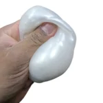 Crunchy Cloud Squishy Toy in pearl white with pink individual packaging and 12-piece wholesale display