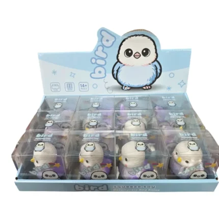 Crunchy Bird Squishy Toy in white and purple with textured surface, individual retail packaging and 12-piece wholesale display by SDMAX Toys Wholesaler