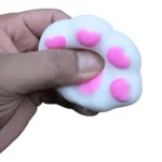 Buy Crunchy Cat Paw Squishy Toys wholesale from SDMAX Toys Wholesaler. Cute 7x6cm paw designs, assorted colours and 12-piece display boxes for retailers.