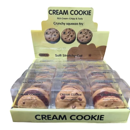 Crunchy Cream Cookie Squishy Toy featuring a golden cookie with chocolate chip details, individual clear packaging and a 12-piece wholesale display box from SDMAX Toys Wholesaler.