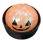 Halloween Mystery Dumpling Squishy Toy featuring an orange glitter pumpkin face, colourful mystery toy display box, 8.5cm size and £2.99 each wholesale price from SDMAX Toys Wholesaler.