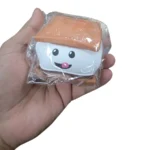 SDMAX Kawaii Foodiez squishy toy wholesale display with 20 individually wrapped food-themed toys, five assorted designs, approximately 9x5cm, £1.85 each.