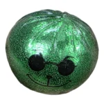 Grinch Mystery Dumplings Squishy Toy wholesale display box with green glitter-effect character toys, 12 per box, approximately 8.5cm, £2.25 each, from SDMAX Toys Wholesaler.