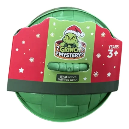 Grinch Mystery Dumplings Squishy Toy wholesale display box with green glitter-effect character toys, 12 per box, approximately 8.5cm, £2.25 each, from SDMAX Toys Wholesaler.