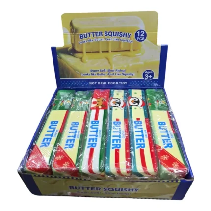 Jumbo Christmas Butter Squishy Toy in festive red, green and white packaging, displayed with a box of 12, 23 × 4.5cm size and £2.50 each wholesale price by SDMAX Toys Wholesaler.
