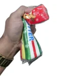 Jumbo Christmas Butter Squishy Toy in festive red, green and white packaging, displayed with a box of 12, 23 × 4.5cm size and £2.50 each wholesale price by SDMAX Toys Wholesaler.