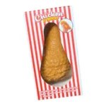 Jumbo fried chicken drumstick squishy toy in golden orange with a bumpy crispy-style texture, retail display box of 12, £2.99 each, SDMAX Toys Wholesaler.