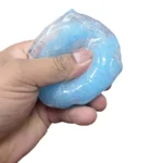 Slush Crush Cheese Cube Squishy Toy with a translucent glittery finish, blue and assorted colours, 6cm, individual display packaging and 12 pieces per wholesale box.