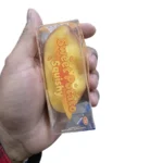 Sweet Potato Squishy Toy wholesale display showing golden-yellow sweet potato-shaped toys, individual packaging, retail display box, £2.50 each and 12 pieces per box – SDMAX Toys Wholesaler.
