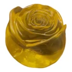 Flowers of Love rose-shaped novelty squeeze toys in red, blue, yellow and purple, displayed in a pink box of 12 by SDMAX Toys Wholesaler.