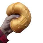 Jumbo Coin Squishy Toy in gold dollar coin design with retail packaging, 15 × 5 cm, advertised at £5.50 each and supplied in boxes of 6 by SDMAX Toys Wholesaler.