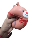 Jumbo Christmas reindeer squishy toy with red scarf, 15 × 14 cm, displayed with wholesale packaging from SDMAX Toys Wholesaler.