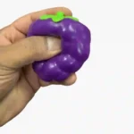Crunchy Mix Fruit Squishy Toys wholesale display box with colourful fruit-inspired squeeze toys in assorted colours, 12 pieces per box, from SDMAX Toys Wholesaler.