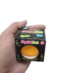 Glow Up SquishDoh round squishy squeeze toys in four assorted colours, 6 × 6 cm, displayed in a wholesale box of 12 by SDMAX Toys Wholesaler.