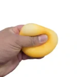 Glow Up SquishDoh round squishy squeeze toys in four assorted colours, 6 × 6 cm, displayed in a wholesale box of 12 by SDMAX Toys Wholesaler.