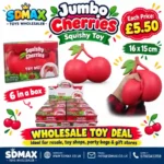 Jumbo red double cherry squishy toy with green stem, approximately 16 × 15 cm, shown with retail packaging and wholesale display box of 6.