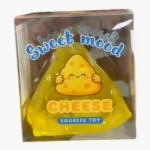 Triangle cheese squishy squeeze toys in yellow and green with 12-piece wholesale display box by SDMAX Toys Wholesaler.